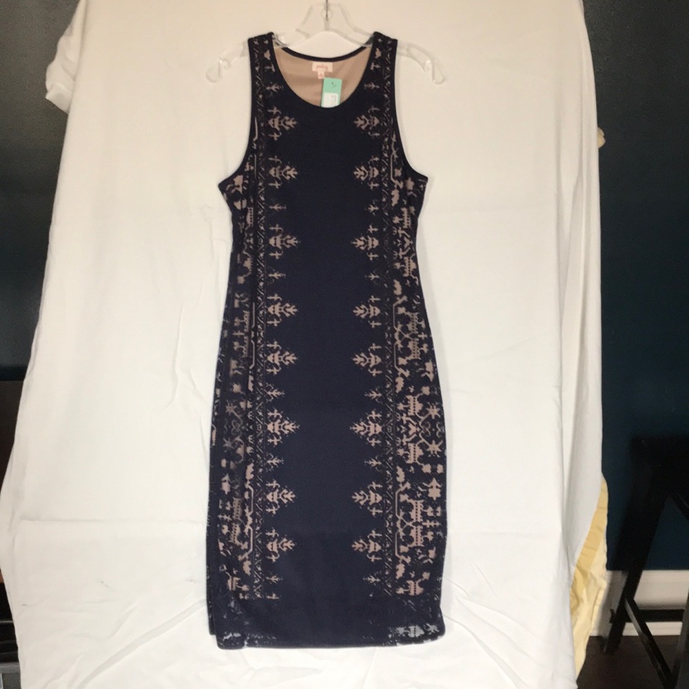 Nude dress with navy lace overlay